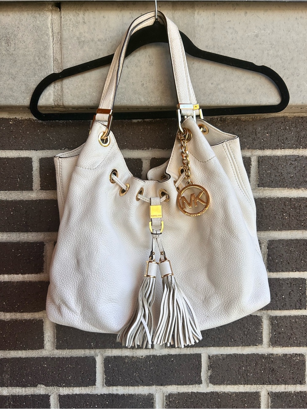 Michael Kors Cream Leather Tassel Hobo with Gold Hardware